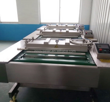 Τροφική συσκευασία κατασκευασμένη 500 KG αυτόματη συνεχής ρολάρισμα ζώνη Vakuum συσκευασία μηχανή